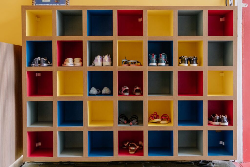 Cube shelf unit with bright red, blue and yellow compartments
