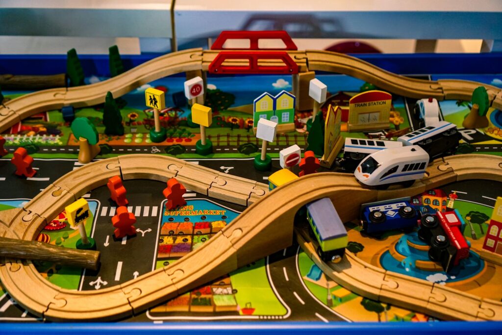 Colorful toy track set with bridges, ramps and vehicles