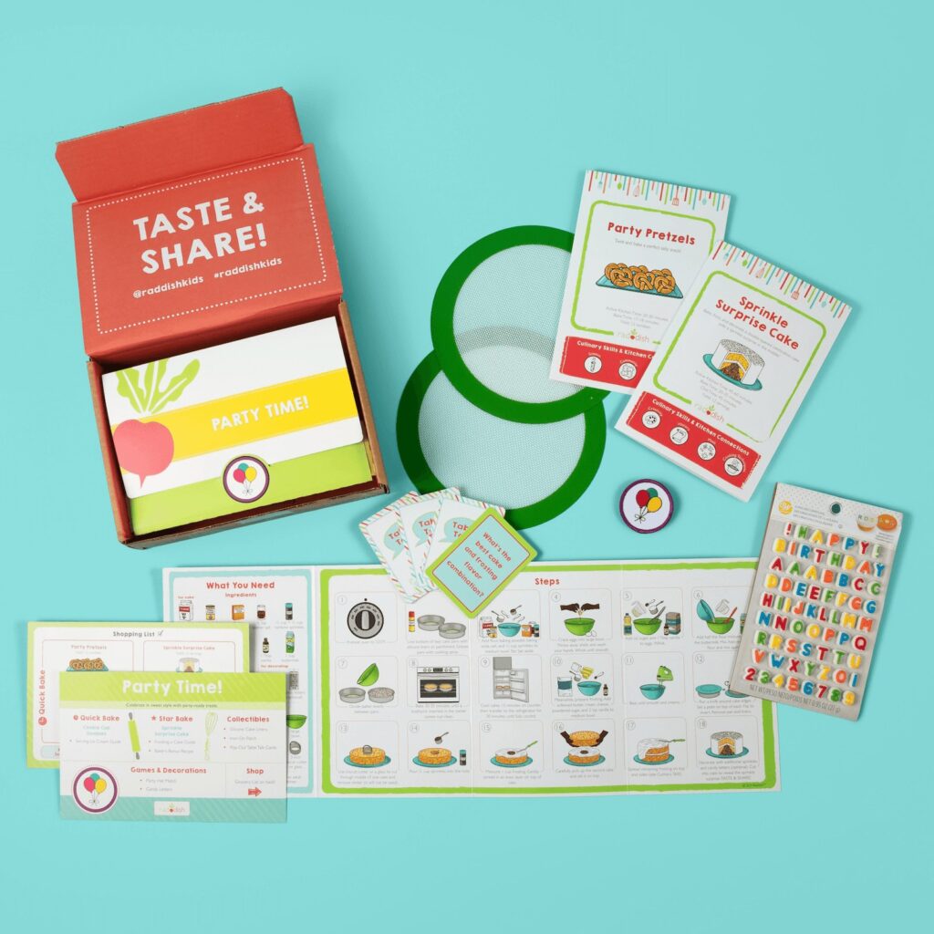 Raddish Party Time Baking Kit with recipe cards, a kitchen tool and activity sheets